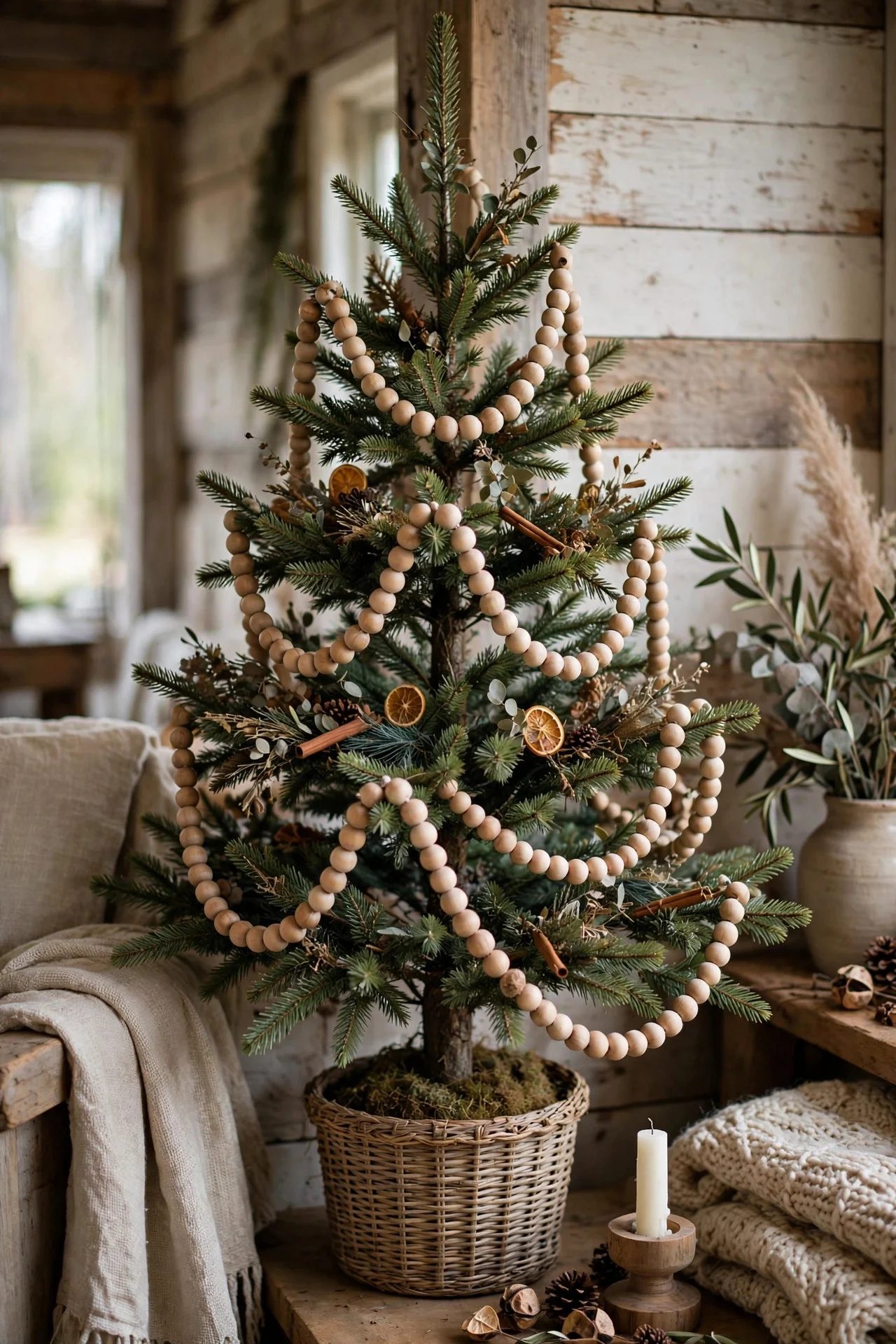 Wooden bead garland draped on a rustic Christmas tree