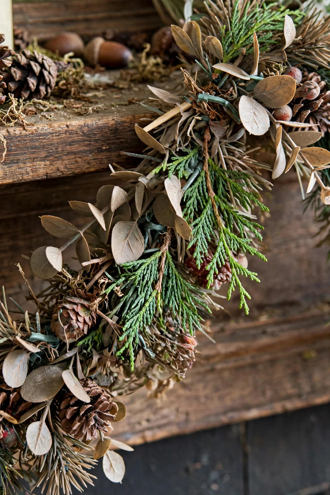 Fresh cedar picks refreshing an old artificial garland